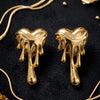 Gold Dripping Heart Statement Earrings for Women | Trendy Designer Earrings | Trendy Earrings For Causal & Party Wear