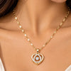 Gold-Toned Double Heart Pendant Necklace with Sparkling Stone